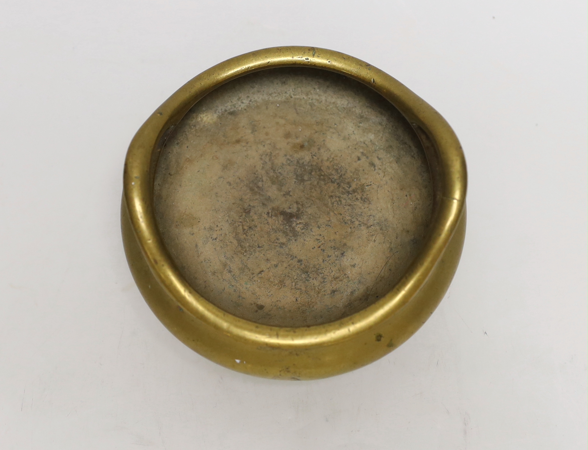A Chinese bronze tripod censer, ding, Xuande mark but 19th century, 13cm wide